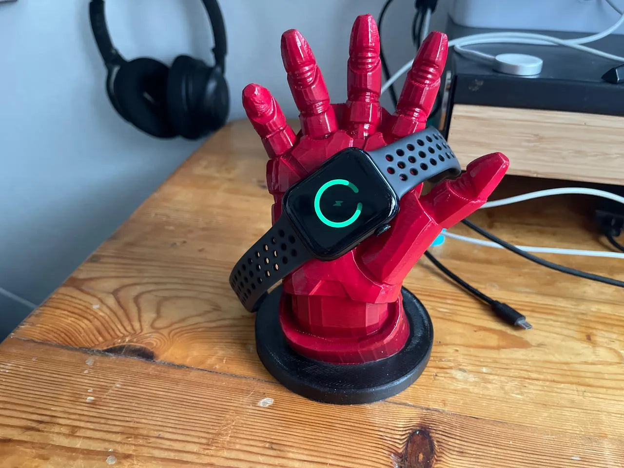 Iron man hand apple watch charging base