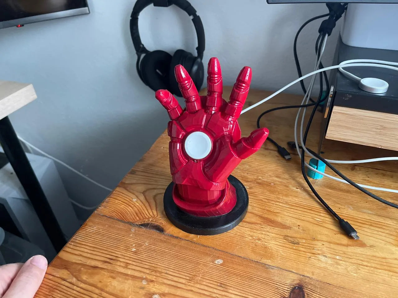 Iron man hand apple watch charging base