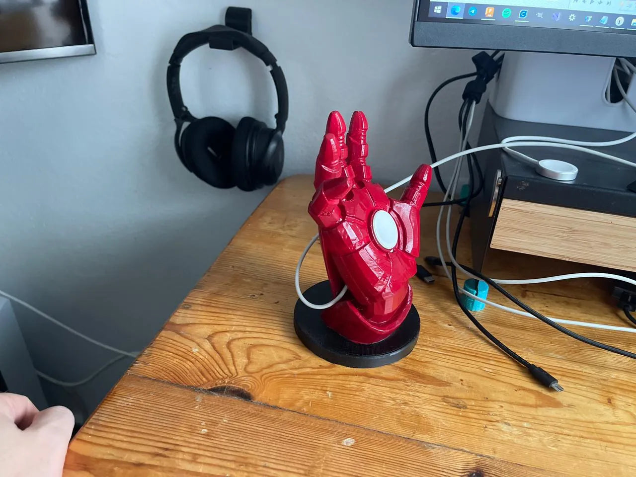 Iron man hand apple watch charging base