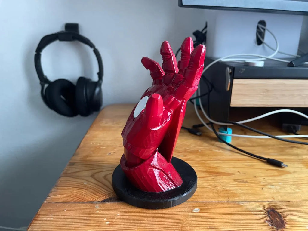 Iron man hand apple watch charging base
