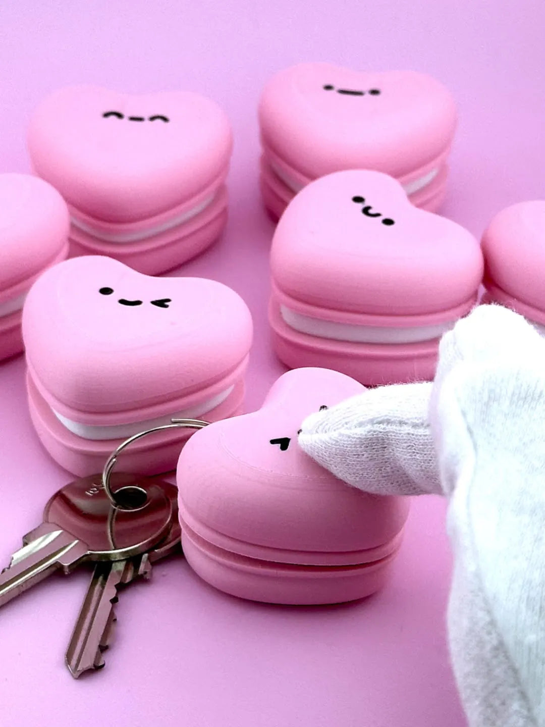 Macaroon heart clicker (comes with a random face )