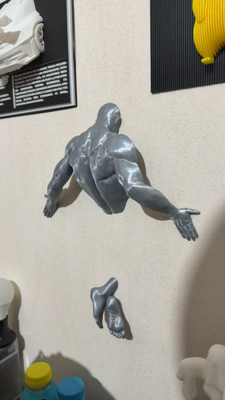 Man pushing wall